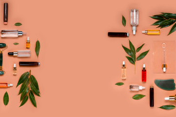 Natural Serums and face oils. Cosmetic hydrating serum in a glass bottle with pipette close up....