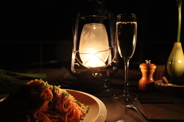 Romantic  night dinner with a gas lantern and champagne © Felipe