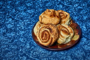 Fresh sweet homemade buns, homemade baked goods.