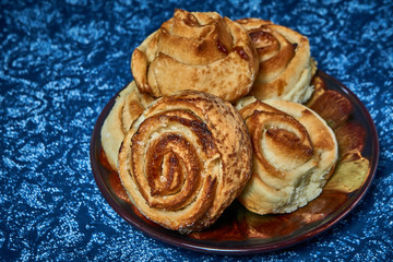 Fresh sweet homemade buns, homemade baked goods.