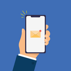 New Email Notification on smartphone screen. Hand holds the smartphone. Modern Flat design illustration.