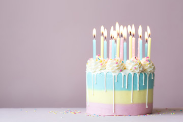 Pastel birthday cake with birthday candles