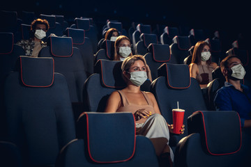Cinema, movie theatre during quarantine. Coronavirus pandemic safety rules, social distance during...