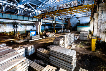 Old abandoned industrial warehouse at sunny day