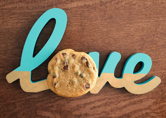 chocolate chip cookies on the table with love text