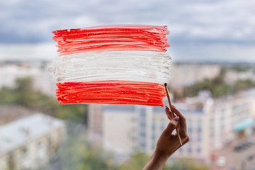 Day of the proclamation of the Republic of Latvia November 18th. Patriotic drawing on the window. Pride honor. patriotism elections. Flag white red. Woman voting. Austria Nationalfeiertag October 26