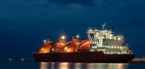 Tanker in the port with lights on, night photography