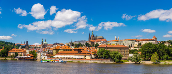 Fototapeta na wymiar A view of old Prague from the Vltava river on a lovely lazy afternoon