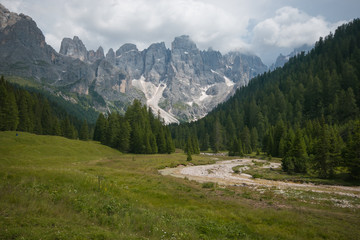 Fototapeta na wymiar Beautiful view of Val Venegia on cloudy summer day in Trentino, Italy