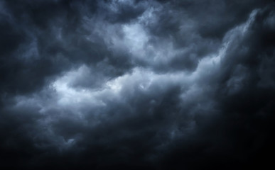 The typhoon, tornado in a stormy dark sky with black clouds and a strong wind. Panoramic image. Concept on the theme of weather, natural disasters, tornadoes, typhoons, tornadoes, thunderstorm.