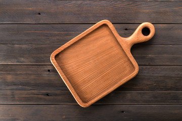 serving board on wooden background