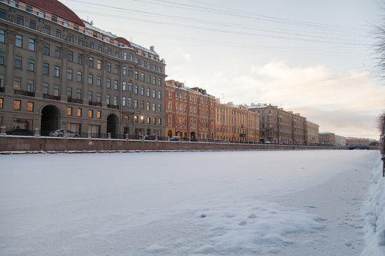Winter cityscape of St. Petersburg with the freezing Fontanka river