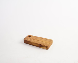 a cutting board made of used wood, commonly used for chopping bones, cutting meat.