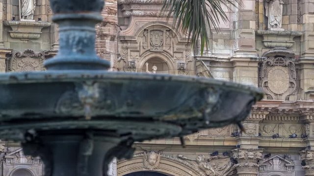 Staue on The Basilica Cathedral of Lima is a Roman Catholic cathedral located in the Plaza Mayor timelapse hyperlapse in Lima, Peru. Close up view to decoration elements