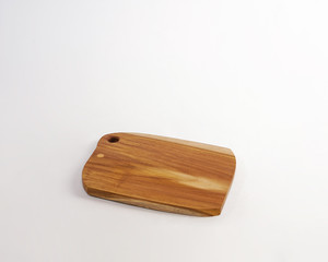 a cutting board made of used wood, commonly used for chopping bones, cutting meat.