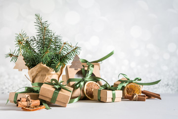 Christmas zero waste, environmentally friendly gift wrapping craft paper fir branches, gift basket,...
