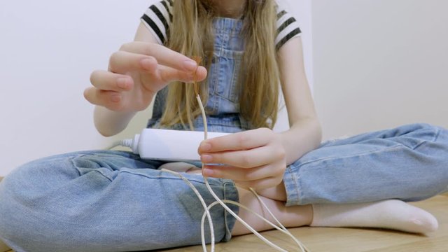 Child safety concept.Child playing with electricity