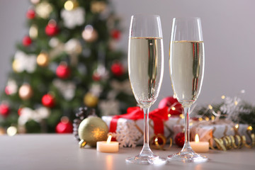 glasses with champagne on the table. Background with place for text for the new year holiday