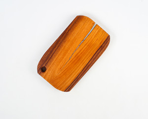 a cutting board made of used wood, commonly used for chopping bones, cutting meat.