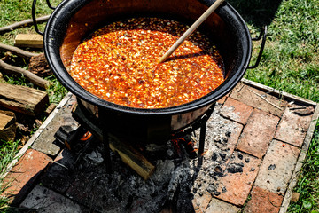traditional Hungarian goulash soup in the cauldron