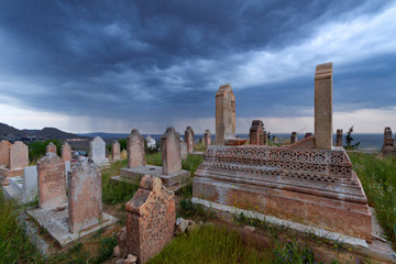 Ancient muslim cemetery on a stormy day in Mardin, Turkey.
