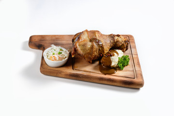 knuckle with sauce on the board