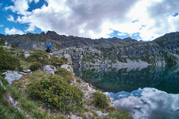 Obraz premium Trekking for the Vercoche lake in Valle D'Aosta, Italy