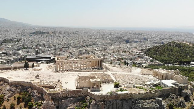 Rotating aerial shot of the Acropolis of Athens during summer period, Athens, Greece.