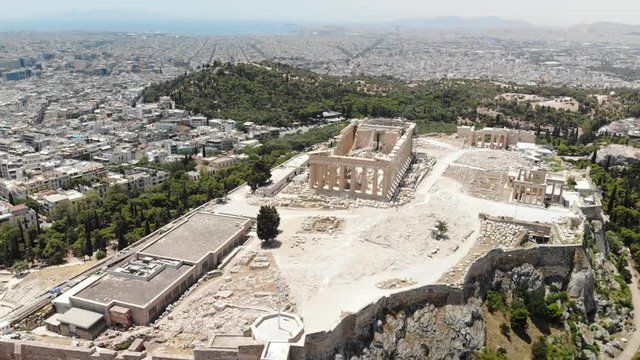 Panoramic aerial shot of the Acropolis of Athens ancient citadel, including Parthenon, Erechtheion and Acropolis museum in the background. Athens, Europe, Greece.