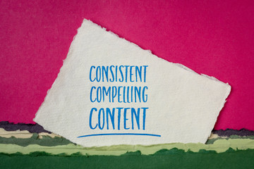 consistent, compelling content -  advice for blogging and social media marketing -  handwriting on a handmade paper, business and creativity concept
