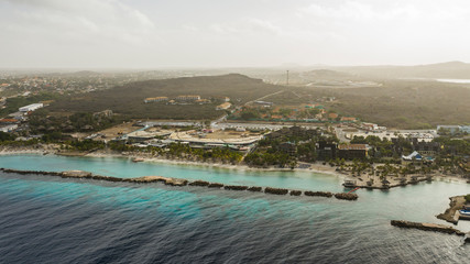 Aerial view of coast of Curaçao in the Caribbean Sea with turquoise water, cliff, beach and...