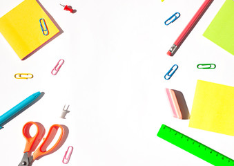 Colorful School stationery concept flat lay on the white paper background. Top view. Copy space