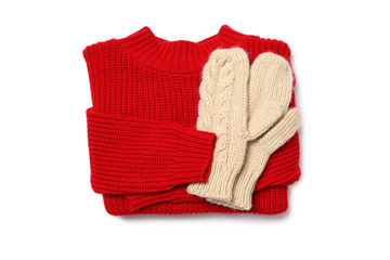 Knitted sweater and mittens isolated on white background