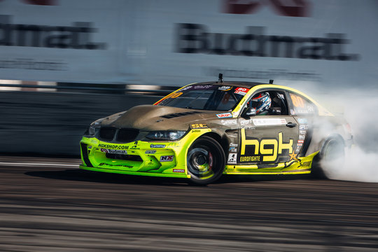 BMW M3 E92 Eurofighter in drift. Car go at the full speed in slide with a lot of smoke