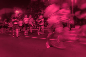 Fototapeta na wymiar Marathon runners. Blurred motion group athletes, city street. Abstract sport background. Fitness and healthy lifestyle, sport activity concept.