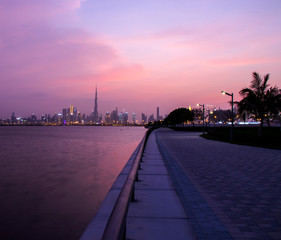 Fototapeta premium Sunset over a skyline of a beautiful city of Dubai. UAE.