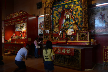 people praying to buddha at Kuala lumpur Malaysia