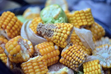 Chopped pieces of corn in a bucket