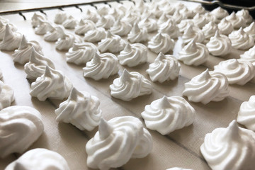 Close up image of white homemade marshmallow dried in rows in the kitchen. Cooking at home concept.