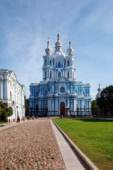 Smolny Cathedral close-up on sun afternoon day. Unique urban landscape center Saint Petersburg. Central historical sights city. Top tourist places in Russia. Capital Russian Empire
