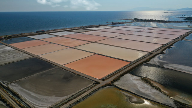 Aerial drone photo of colourful artificial sea salt ponds