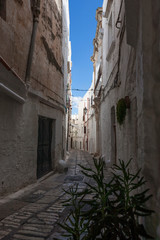 Fototapeta na wymiar Via Continelli Bixio, a picturesque lane in the old centre (