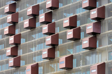 Welding Mask Styled Facade of a Residential Building