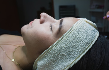 Young woman ready to receive facial treatment