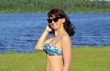 woman resting on the lake