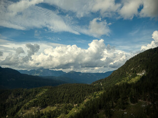 Fototapeta na wymiar Gosausee mountain peaks aerial view with clouds
