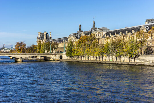 View of famous Louvre Museum from the Seine river. Louvre Museum is one of the largest and most visited museums worldwide. PARIS, FRANCE. November 12, 2014.