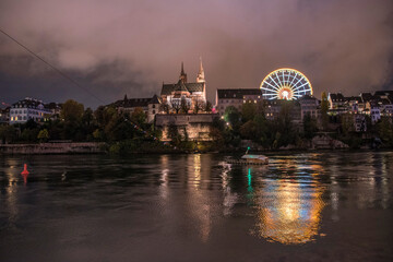 Basel Minster over the Rhine by night
