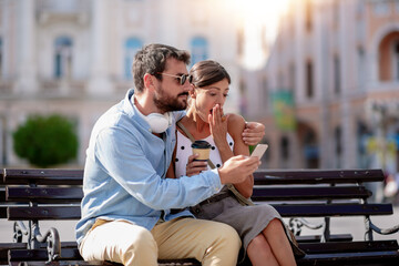 Happy couple enjoying together outdoors.