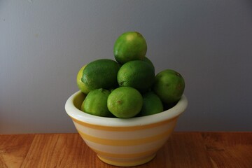 fresh limes in bowl